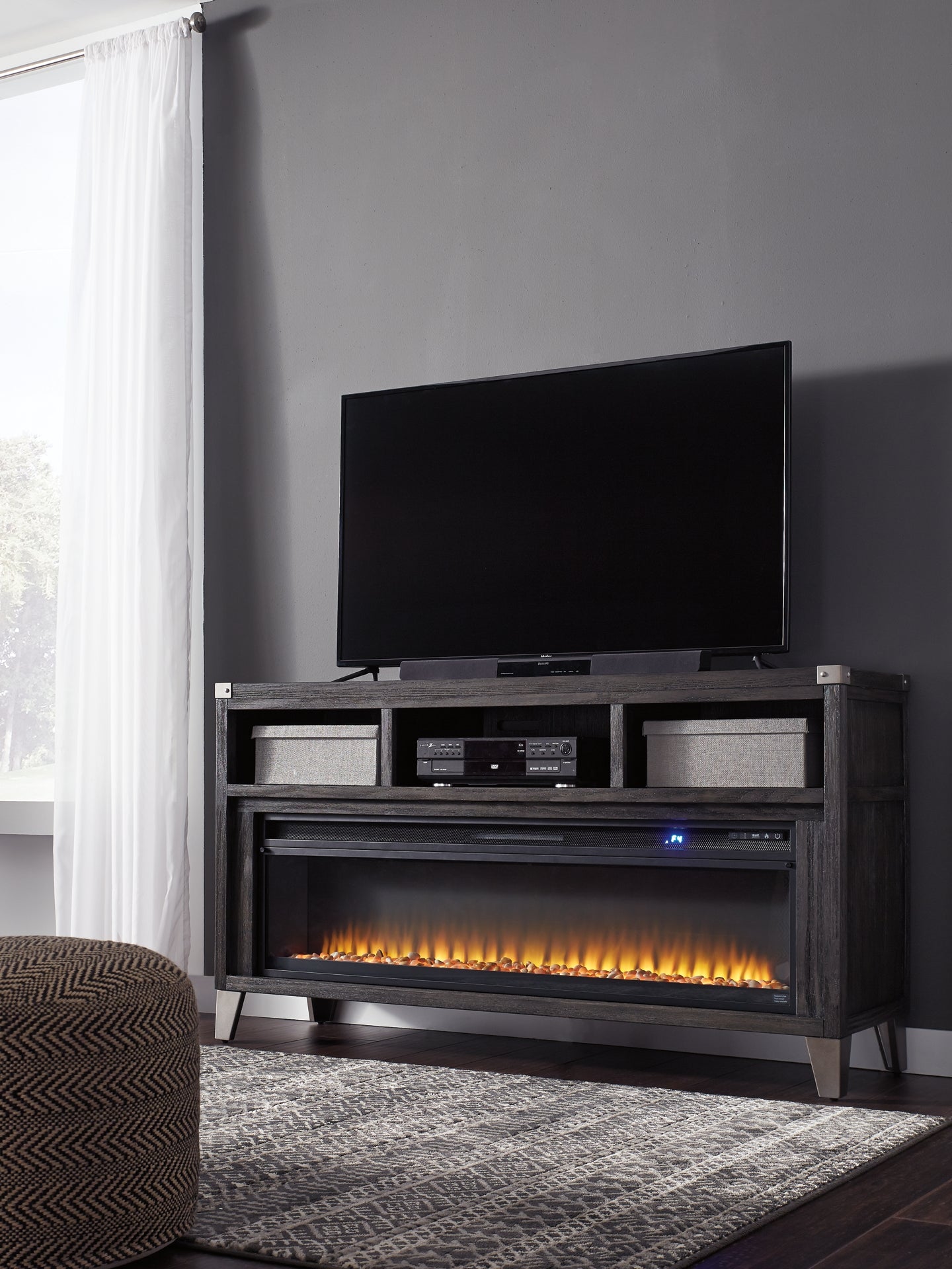 Mueble de TV Todoe de 65" con chimenea eléctrica