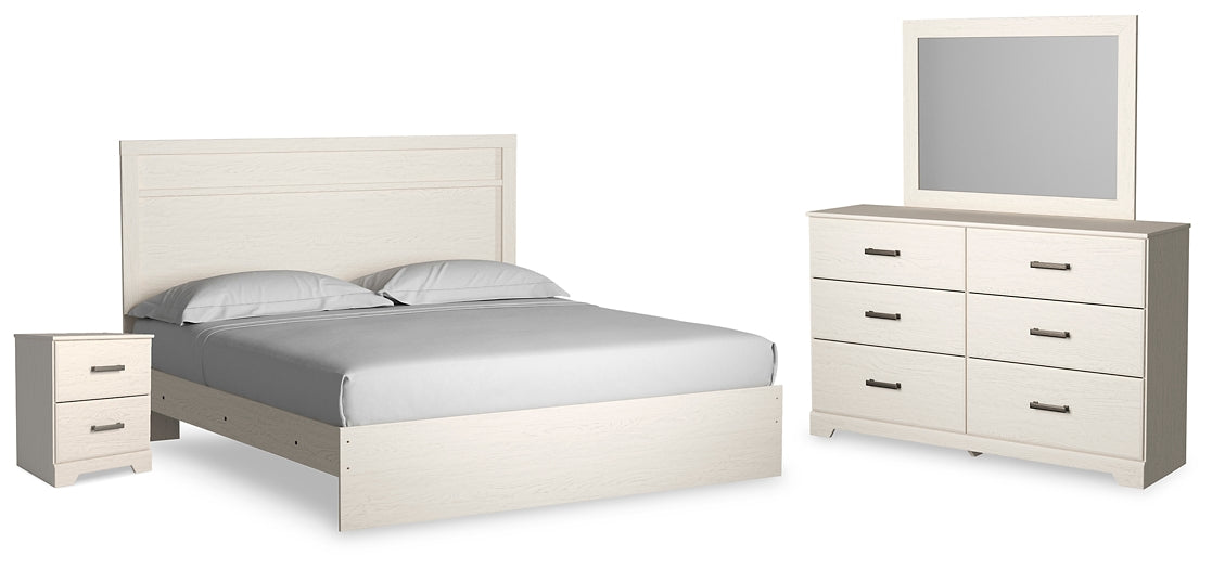 Stelsie King Panel Bed with Mirrored Dresser and Nightstand