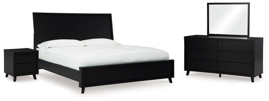 Danziar King Panel Bed with Mirrored Dresser and Nightstand