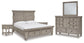 Harrastone Queen Panel Bed with Mirrored Dresser and 2 Nightstands