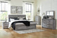 Bronyan King Panel Bed with Mirrored Dresser and Nightstand