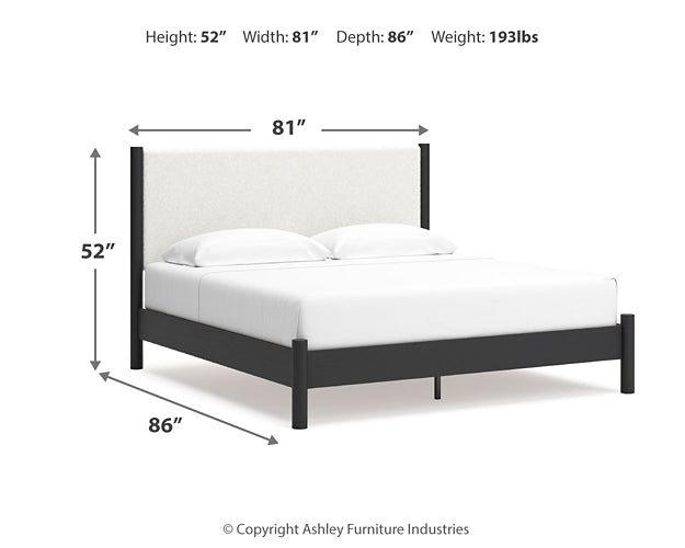 Cama King Cadmori con paneles tapizados y tocador