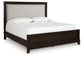 Cama California King con paneles tapizados y tocador con espejo Neymorton