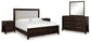 Neymorton California King Upholstered Panel Bed with Mirrored Dresser and 2 Nightstands